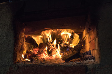 fireplace with burning logs