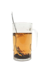 Big glass of hot brew tea isolated on white