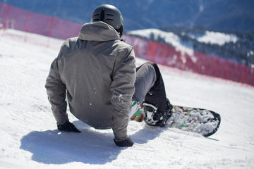 Fototapeta na wymiar Snowboarder on a snowy slope.