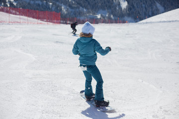 Fototapeta na wymiar Snowboarder on a snowy slope.