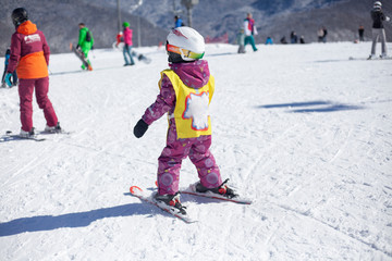 Child skiing on a hillside