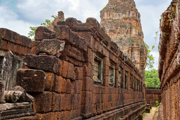 labyrinth in the leper king&rsquo;s terrace, Angkor Wat complex, cloudy weather, window openings and giant porous stones       