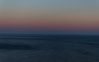 Fototapeta premium Start dawn over sea horizon