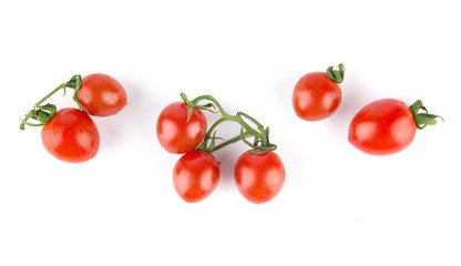 Fresh cherry tomatoes isolated on white background.