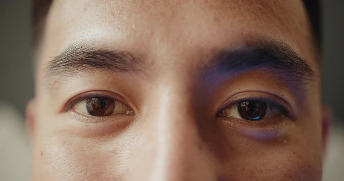 Japanese Asian man eyes close-up detail macro shot, portrait macro of man