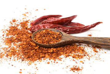 Cayenne pepper (Ground chili) and dried chilli isolated on white background.