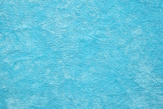 Blue towel fabric texture surface close up background