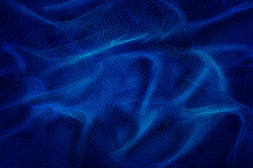 Flowing dynamic particles, forming a technological abstract background like silk