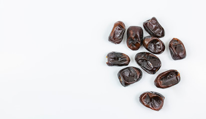 Dates pattern isolated on white background. Top view and copy space