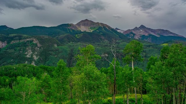 picture perfect mountain peak with Aspens and Pine Trees With Storm front Time Lapse, Timelapse, Time-Lapse, 4K