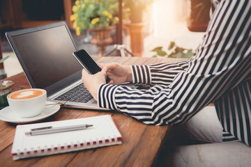 Business women use notebooks.