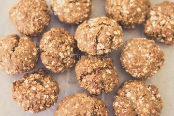 topview of homemade oat cookies on bakery paper