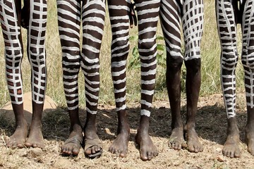 Black Mursi Boy Legs with White Body Paint