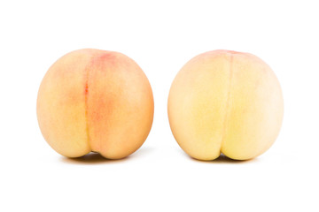 Fresh honey peach isolated on white background.