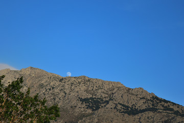 Moon over Saos mountain - view from Therma beach, Samothraki, Greece