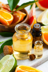 Concept of natural organic ingredients for skin face and body health care. Moisturizing, aromatherapy, detox treatment, anti-stress effect. Fresh fruit, green leaves, white background, close up