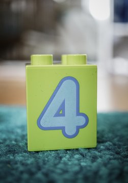 POZNAN, POLAND - Apr 18, 2015: Lego Duplo Toy Block With Number 4.