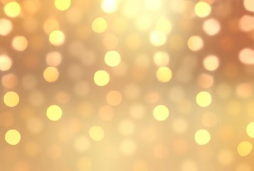 Shimmer golden bokeh holiday background.