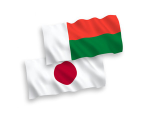 Flags of Japan and Madagascar on a white background