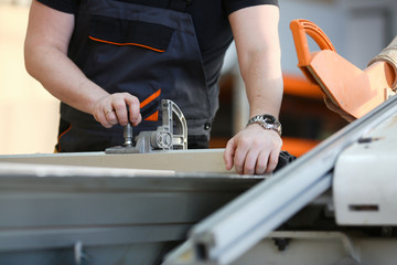 Worker using electric saw portrait. Manual job workplace DIY inspiration improvement fix shop yellow helmet hard hat joinery startup idea industrial education profession career concept