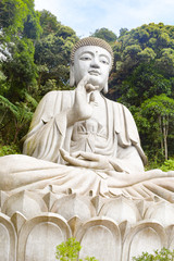 Big Stone buddha which is located at Chin Swee Caves Temple,Genting Highlands. People can see having photo shooting during weekend, Shi Jia Mo Ni Fo statue at Chin Swee Caves Temple. The Chin Swee