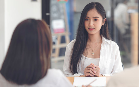 Young beautiful asian woman having job interview.