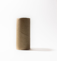 Toilet paper core on white background with light