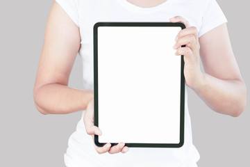 Close up woman hand holding digital tablet computer with white screen for text or product...