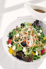 greek salad with feta cheese and olives with citrus vinaigrette