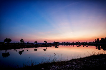 Beautiful sunset sky with reflection on the lake