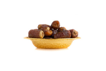 Date fruits or dry dates isolated on white background.Ramadan Kareem Breaking the fast by eating Tamar Dates