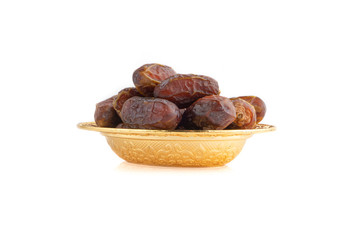 Date fruits or dry dates isolated on white background.Ramadan Kareem Breaking the fast by eating Tamar Dates