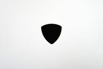 pick guitar on white background, handmade plastic pick guitar