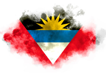 Antigua and Barbuda flag performed from color smoke on the white background. Abstract symbol.