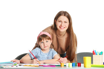 Drawing teacher giving private art lessons to little girl on white background