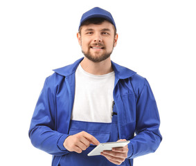 Male truck driver with tablet computer on white background