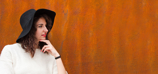 portrait of girl in hat outdoors