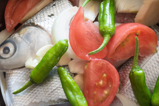 Paksiw na bangus or milkfish in vinegar is a tradional Filipino dish. 