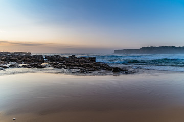 Fototapeta na wymiar Coastal Sunrise Seascape from Rock Platform