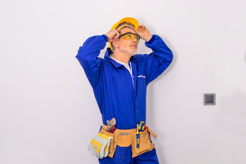 construction worker or professional isolated on color background with tools