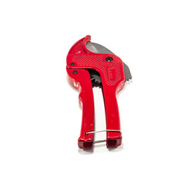 PVC water pipe cutter with red metal body, black rubber handle and sharp thick blade on white background. Easy cutting blue pipe accurately and effectively