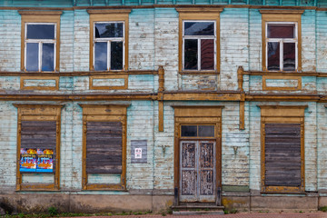 Fototapeta na wymiar VALGA / ESTONIA - SEPTEMBER 2015: Façade of the old wooden building in the historic centre of Valga town, Estonia