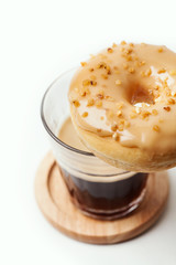 Glass of coffee and donut