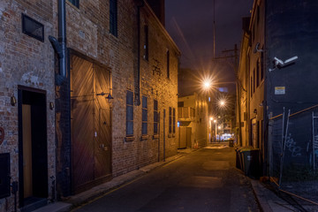 Fototapeta na wymiar narrow street at night - no people