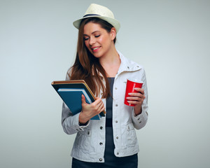 Woman teacher looking on book.