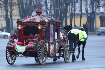 Carriage with two horses, Palace square, St. Petersburg, Russia, November 2019