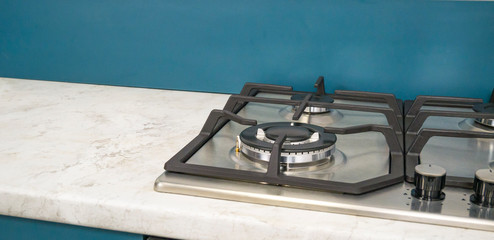 Modern Gas stove wok burner for a large pan . Double gas burner wok. The style of the kitchen.  Modern design.