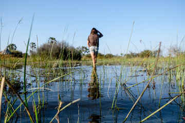 Fototapeta na wymiar man on lake shore.