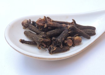 Spice - Cloves are the aromatic flower buds of a tree in the family Myrtaceae, Syzygium aromaticum.It is commonly used as spice. A major component of clove taste is imparted by the chemical eugenol.
