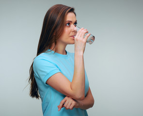 Woman drink water from glass. isolated